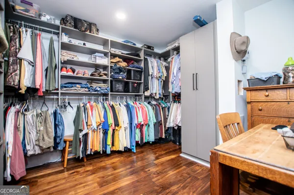 a view of a garage with a bike and a car