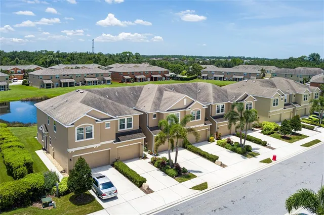 a aerial view of a house with a big yard