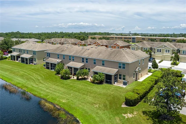 an aerial view of a house with a garden