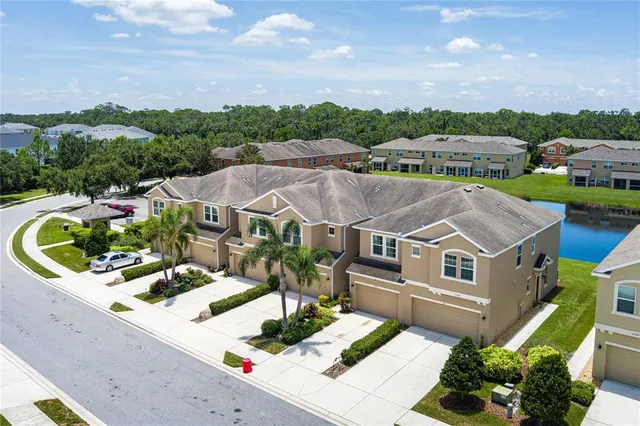 a aerial view of a house with a big yard