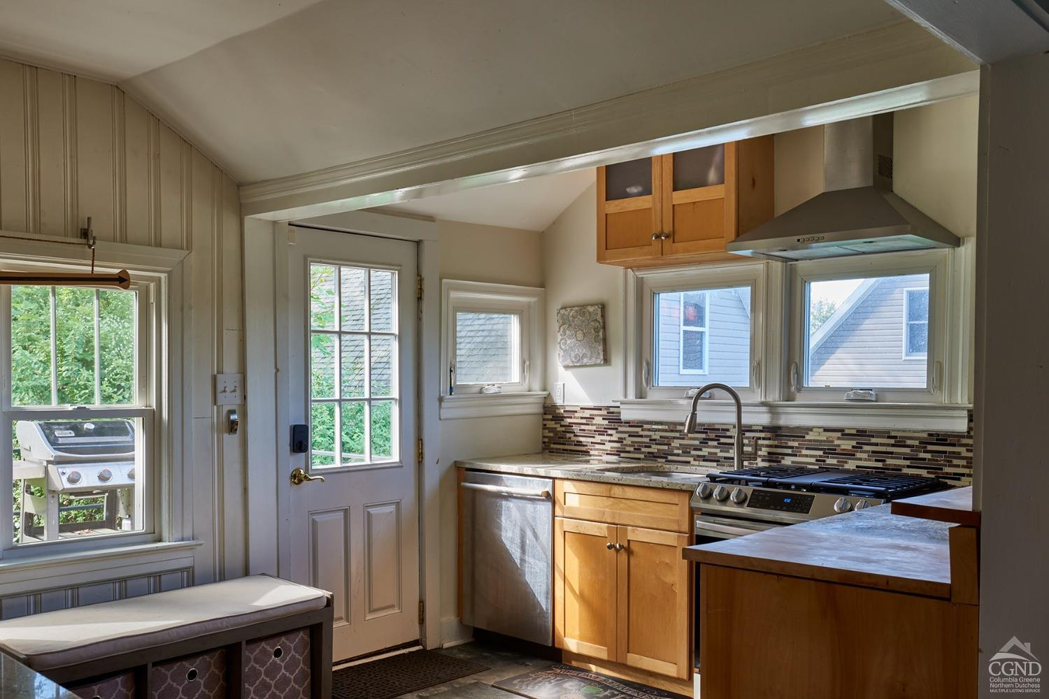 7 Pheasant Road Craryville, NY 12521 - Photo 12 of 26 a kitchen with a sink stove and cabinets