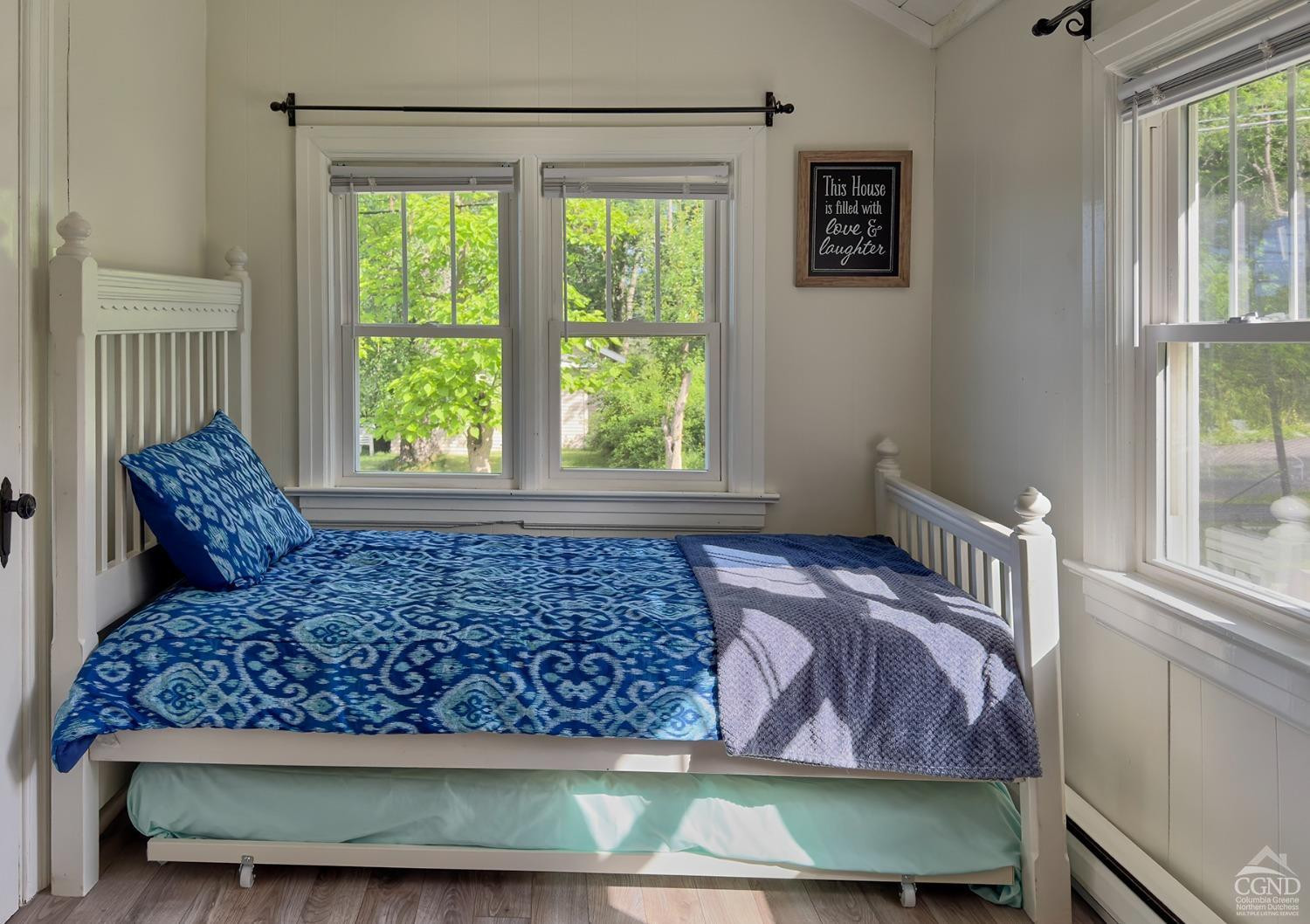 7 Pheasant Road Craryville, NY 12521 - Photo 16 of 26 a bed sitting in a bedroom next to a window