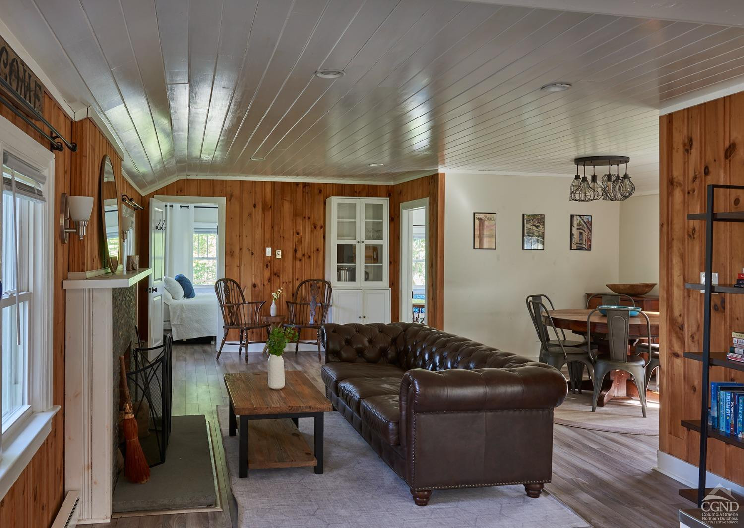 7 Pheasant Road Craryville, NY 12521 - Photo 7 of 26 a living room with furniture fireplace and large windows