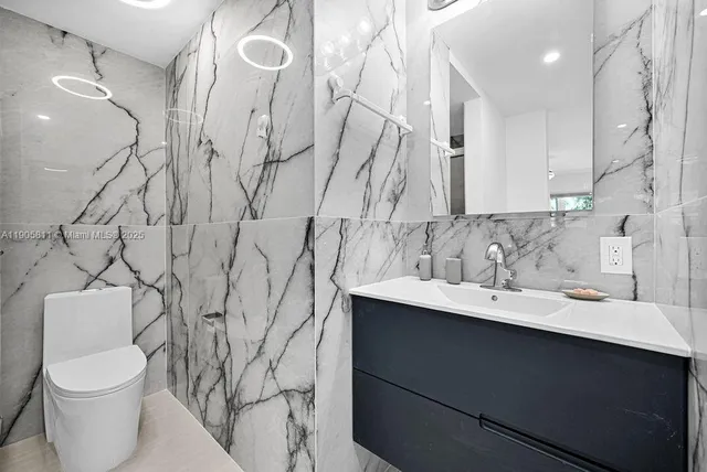 a bathroom with a sink and a toilet