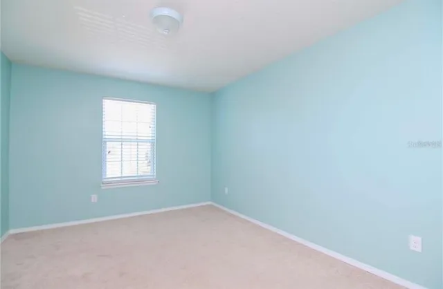 an empty room with a window