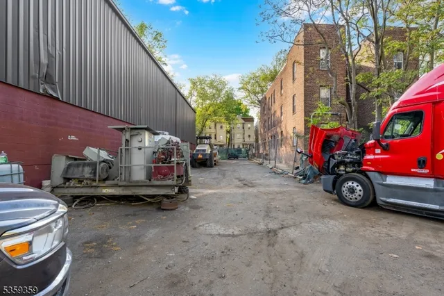 a view of a cars park in front of house