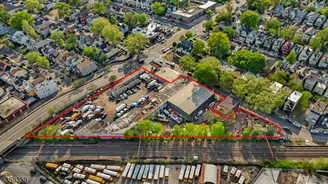 a view of a cars is parked in front of the house