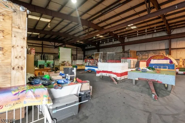 a view of cars parked in front of a house