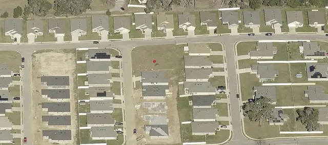 a picture of a bathroom with a glass shower door