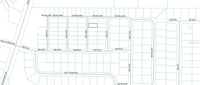 a view of a white wall with a large window