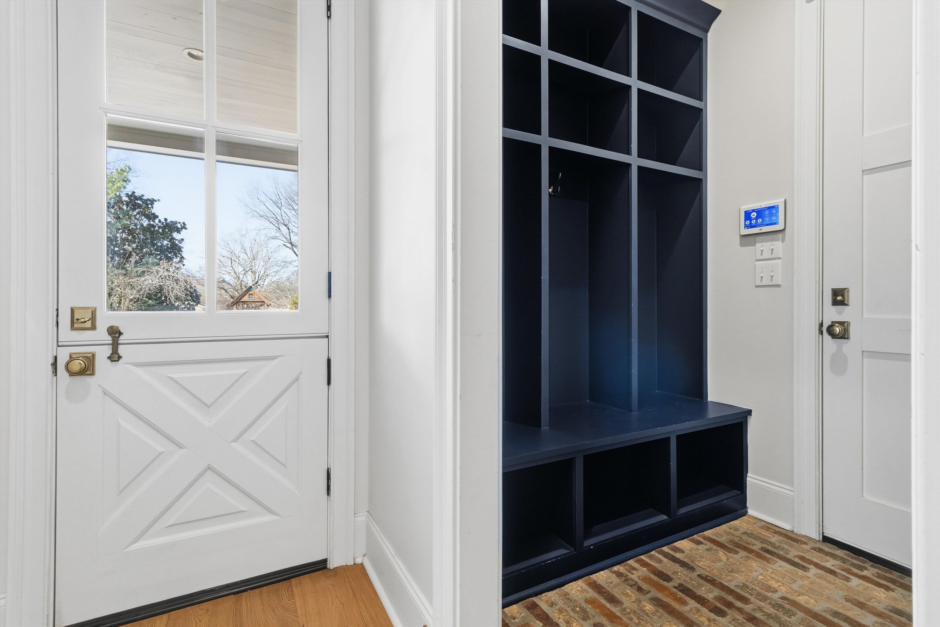 1111 Hayne Road Memphis, TN 38119 - Photo 16 of 40 Mudroom featuring baseboards and light wood-style flooring