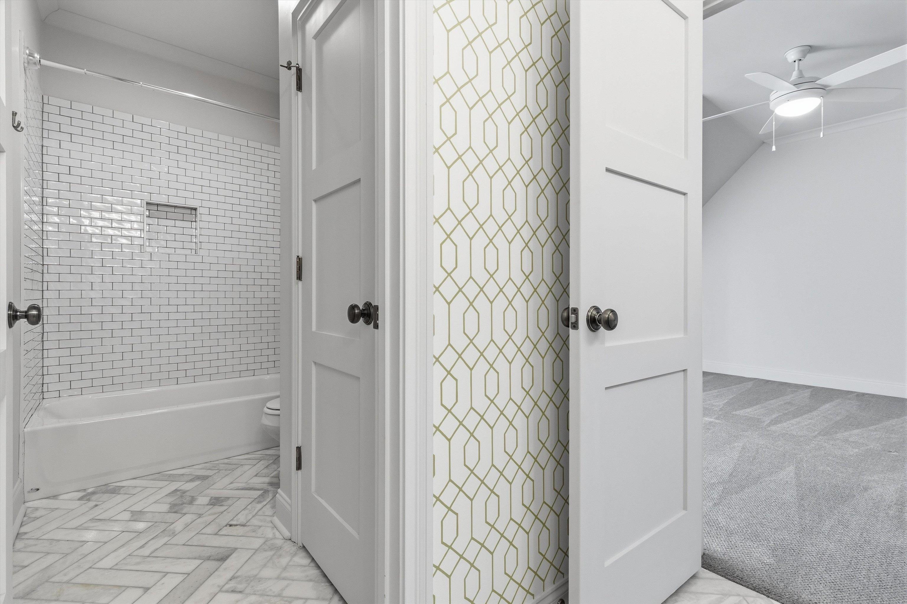 1111 Hayne Road Memphis, TN 38119 - Photo 31 of 40 Bathroom featuring ceiling fan and shower / washtub combination