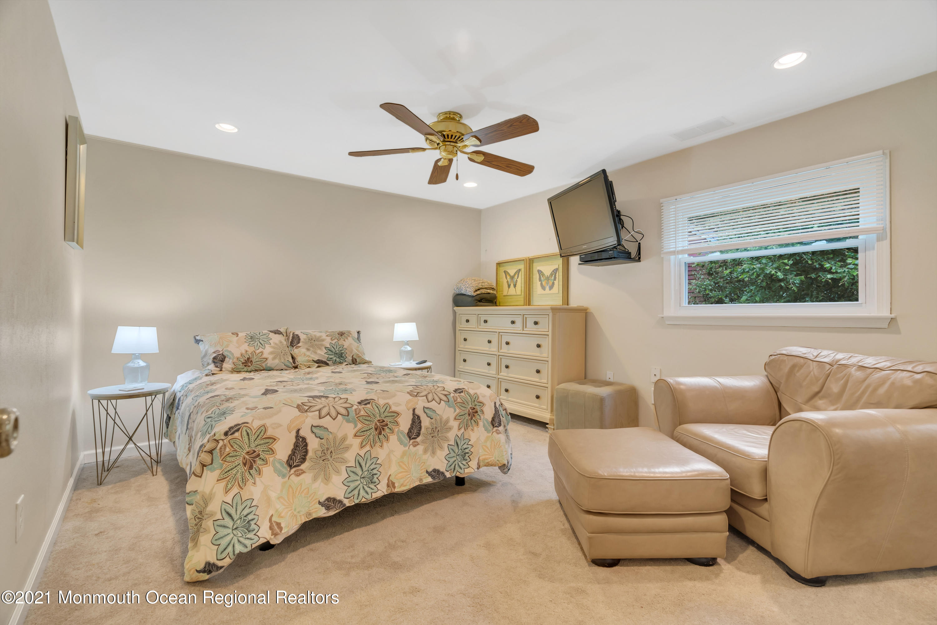 8 Partree Road Jackson, NJ 08527 - Photo 19 of 35 a bedroom with furniture and a large window