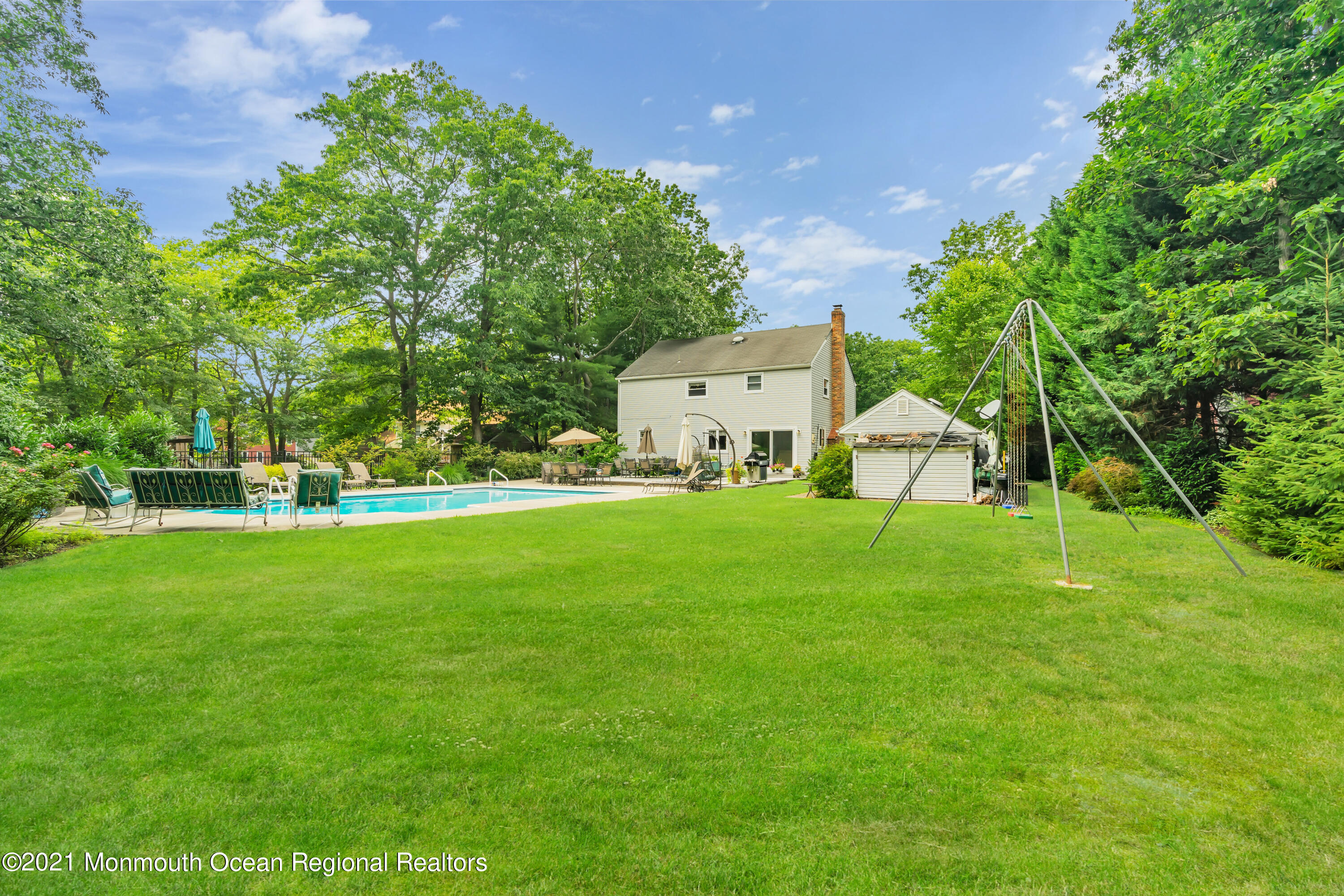 8 Partree Road Jackson, NJ 08527 - Photo 33 of 35 a view of yard with swimming pool and green space
