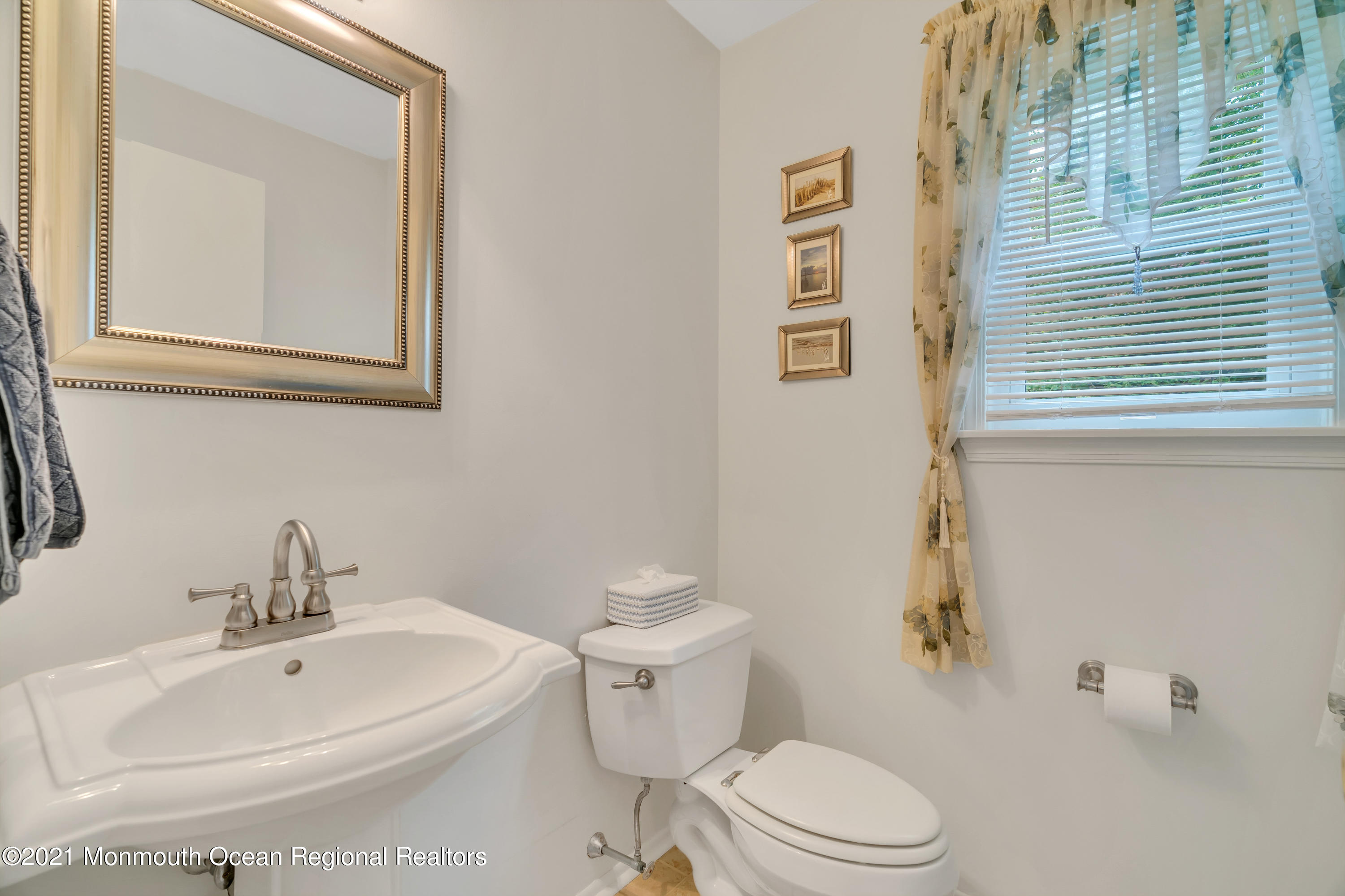 8 Partree Road Jackson, NJ 08527 - Photo 9 of 35 a white toilet sitting next to a bathroom sink