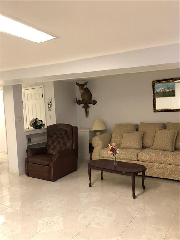 1063 64th Street Brooklyn, NY 11219 - Photo 19 of 20 a living room with furniture