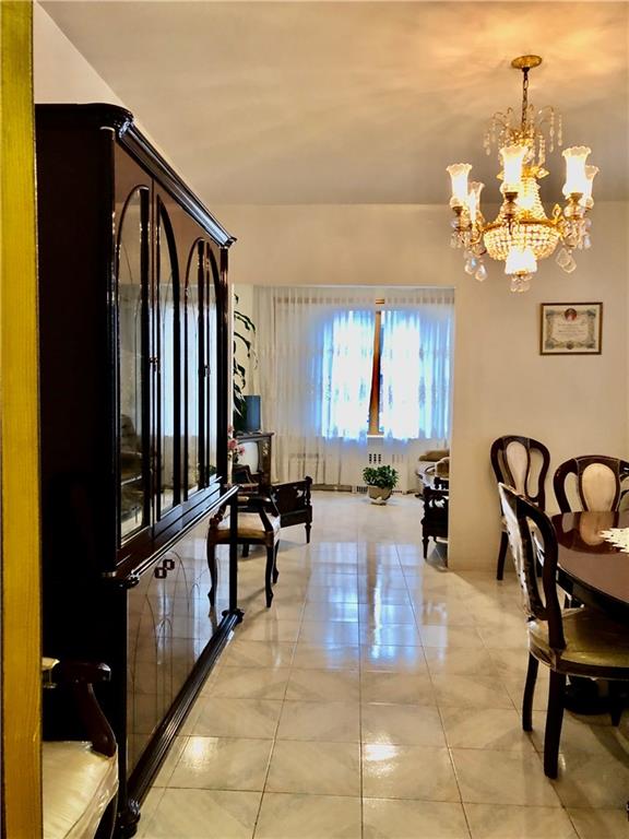 1063 64th Street Brooklyn, NY 11219 - Photo 3 of 20 a lobby with furniture and chandelier