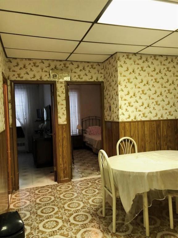 1063 64th Street Brooklyn, NY 11219 - Photo 7 of 20 a balcony with table and chairs