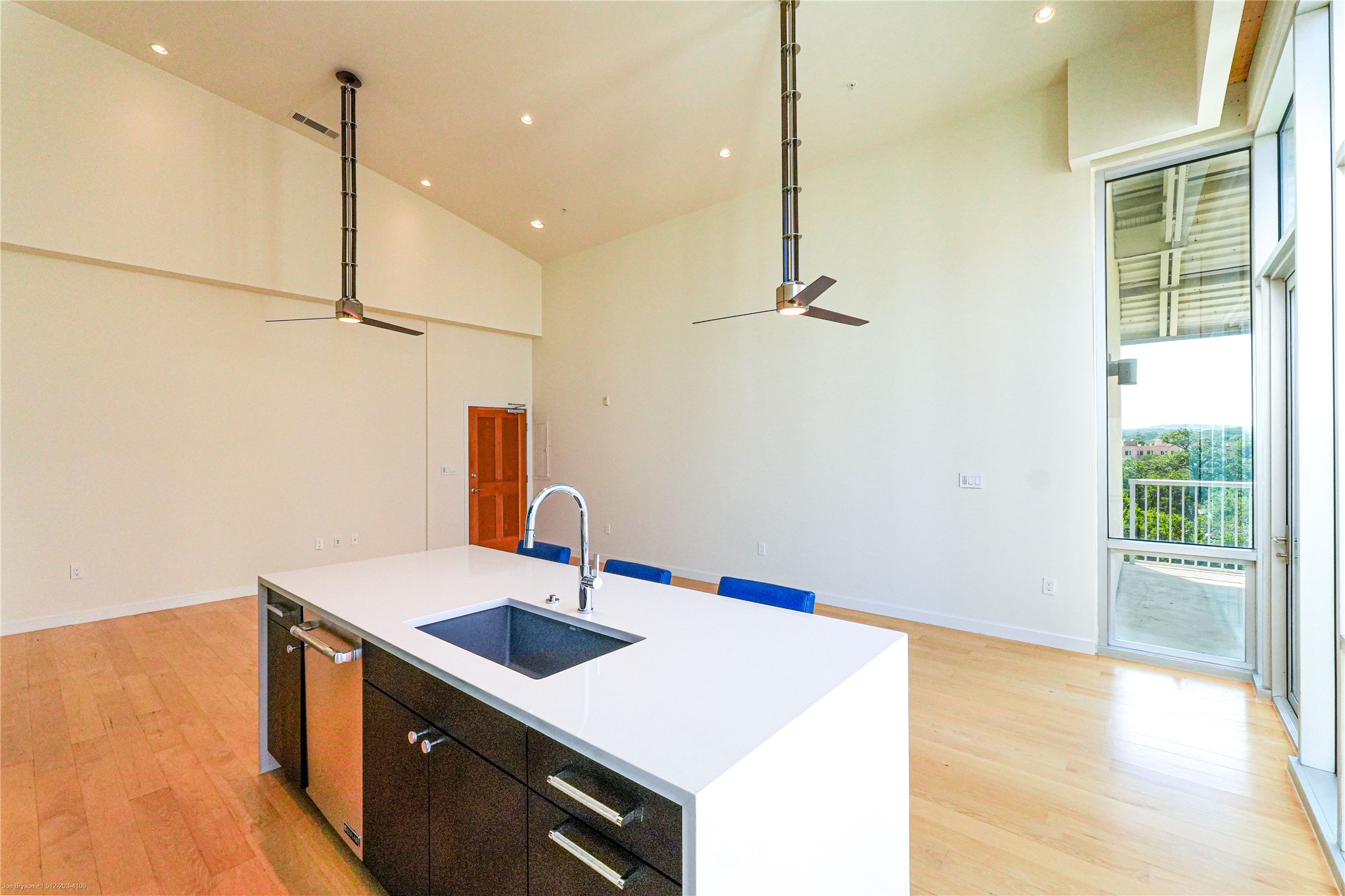 1600 Barton Springs Road, Unit 5601 Austin, TX 78704 - Photo 14 of 38 Flawless execution from top to bottom. Enjoy a completely move-in-ready kitchen, anchored by a new quartz island with abundant cabinet and drawer space.