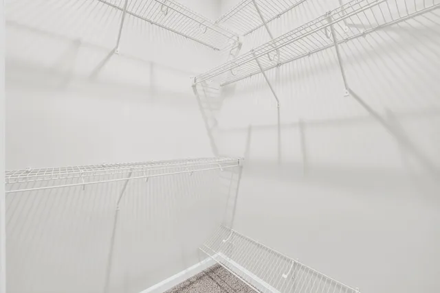 a view of a room with racks on the wall