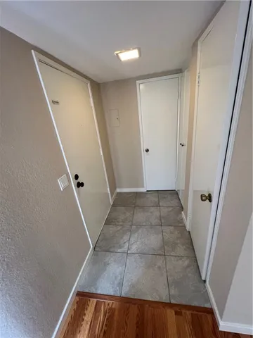 a view of a hallway with a large window