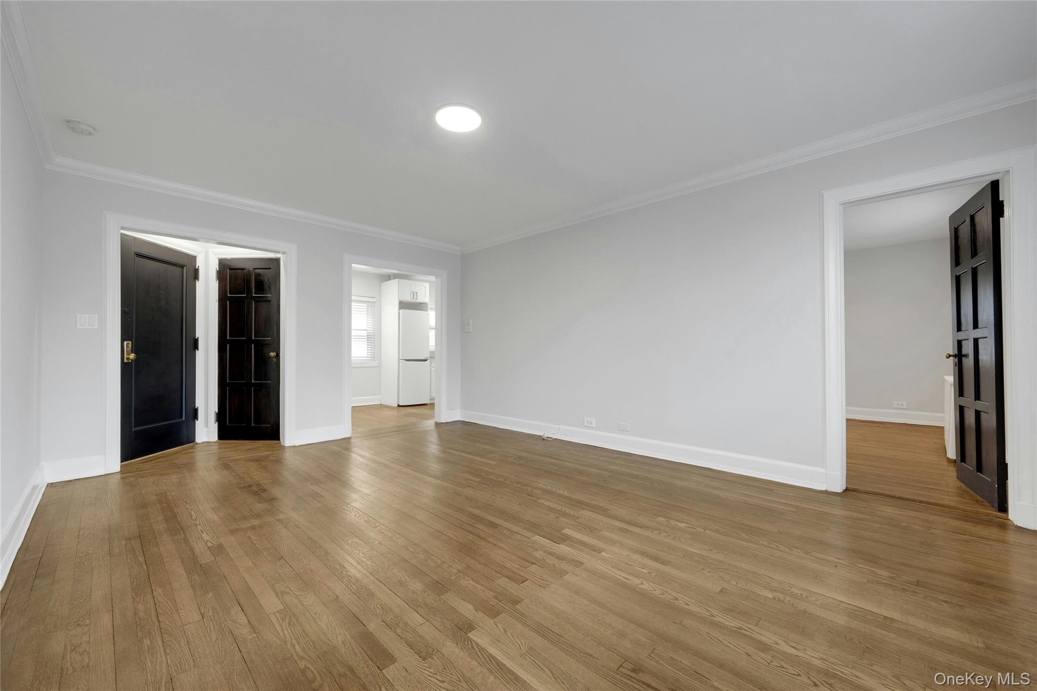 64 Kensington Road, Unit 1A Bronxville, NY 10708 - Photo 5 of 16 Living room facing towards Entry and Kitchen