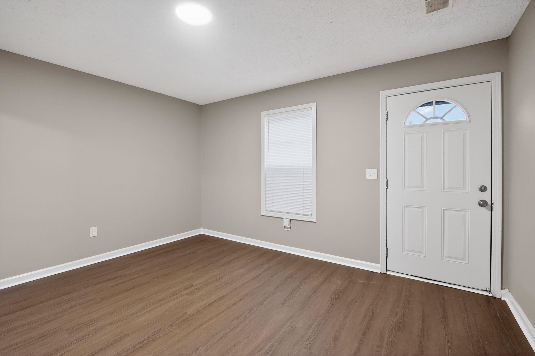 4725 Lofts Road Memphis, TN 38118 - Photo 6 of 32 Entryway with dark wood-type flooring and plenty of natural light