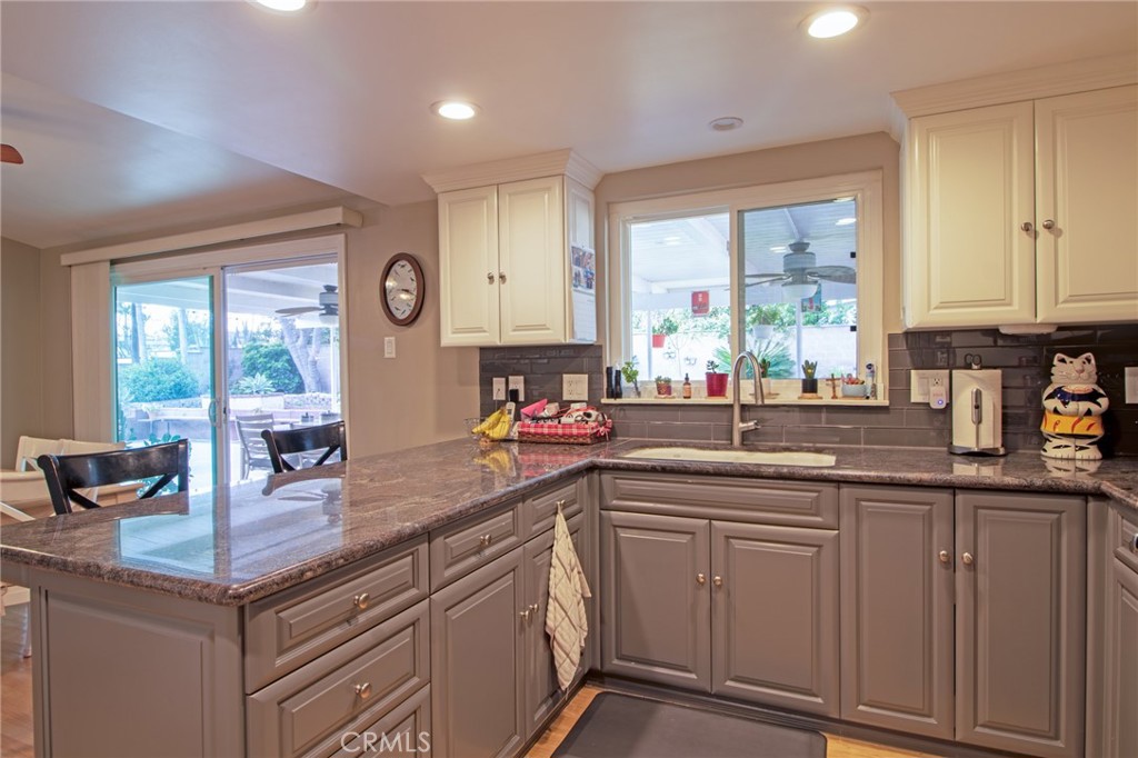 3103 Fish Canyon Road Duarte, CA 91010 - Photo 12 of 20 a kitchen with stainless steel appliances granite countertop a sink a stove and cabinets