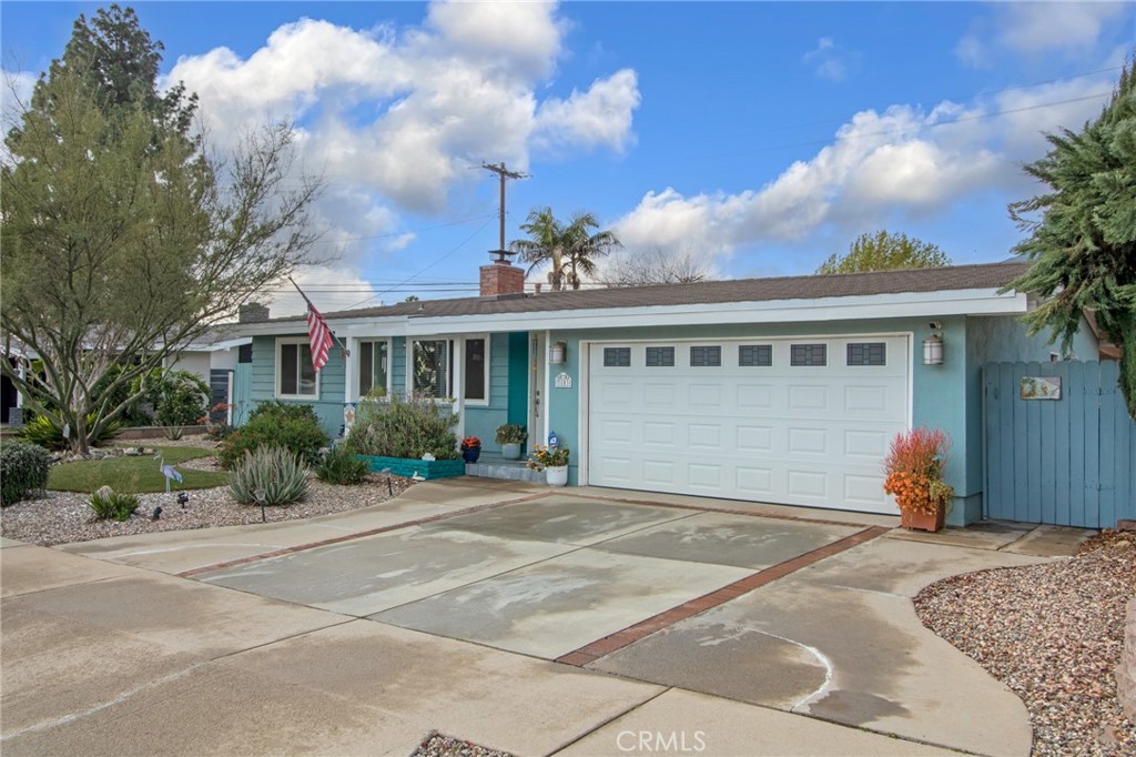 3103 Fish Canyon Road Duarte, CA 91010 - Photo 2 of 20 a front view of a house with a garden and pathway