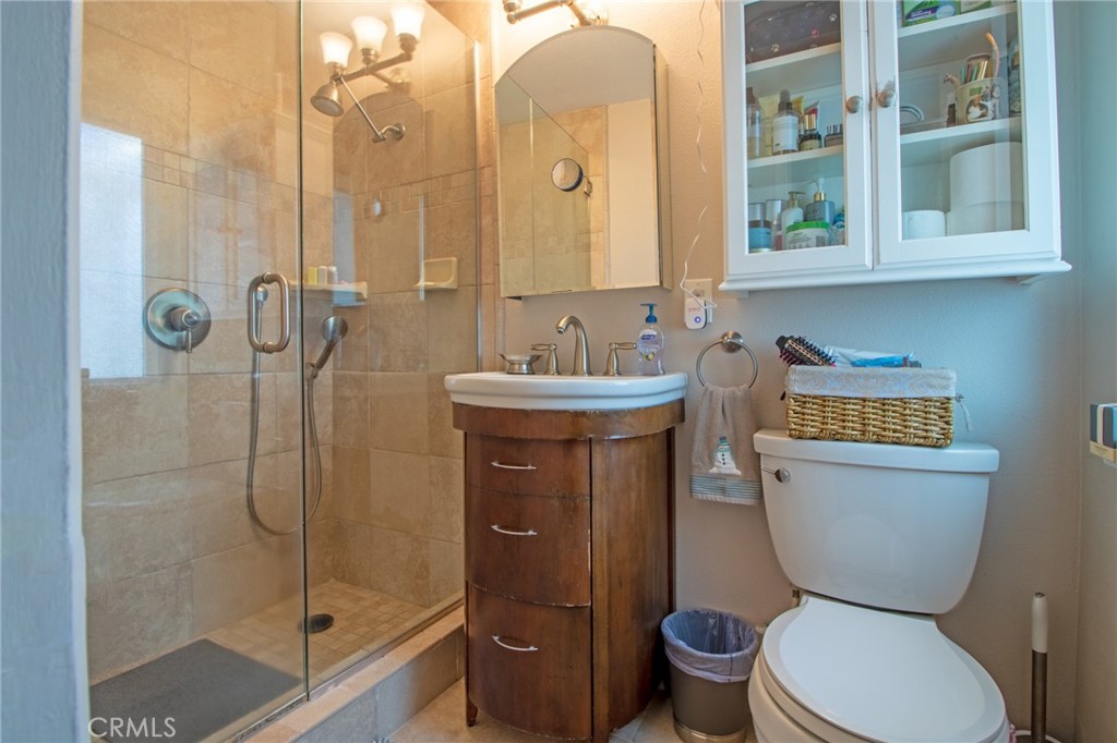 3103 Fish Canyon Road Duarte, CA 91010 - Photo 7 of 20 a bathroom with a toilet sink and shower