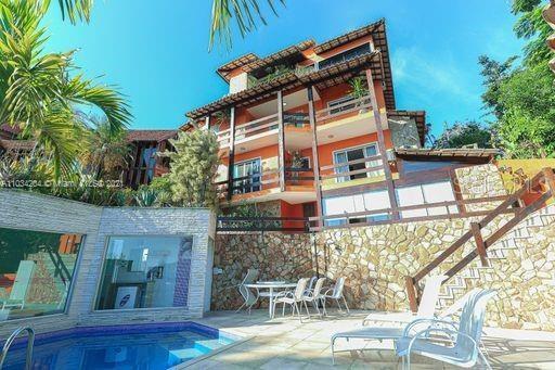 a view of a building with a porch