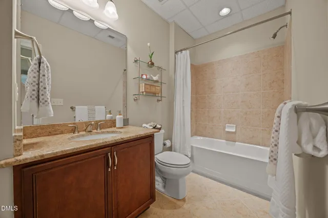 a view of wooden deck and a garden