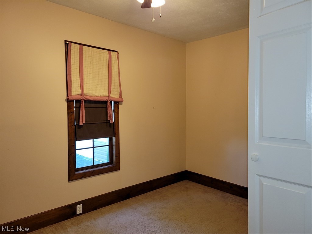 22922 Putney Ridge Road Quaker City, OH 43773 - Photo 15 of 31 View of carpeted empty room
