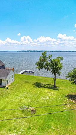 a view of a swimming pool with an ocean view