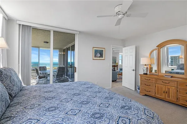 a bedroom with furniture and window