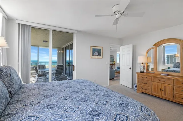 a bedroom with furniture and window
