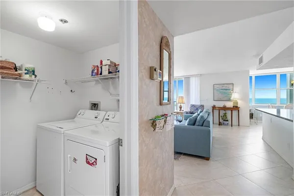a utility room with washer and dryer