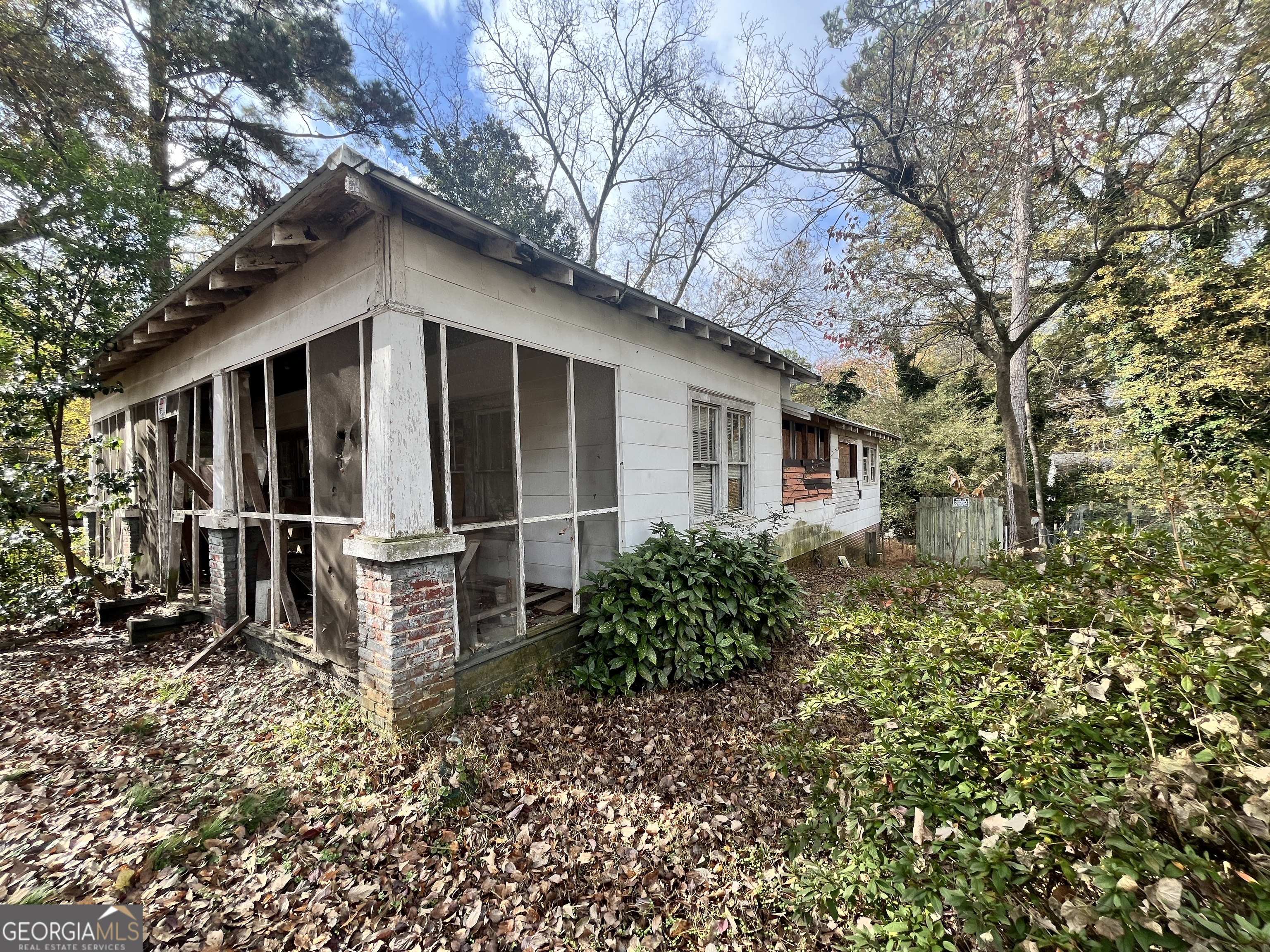 730 Glass Street Northwest Atlanta, GA 30318 - Photo 27 of 50 a view of a house with a yard and wooden fence