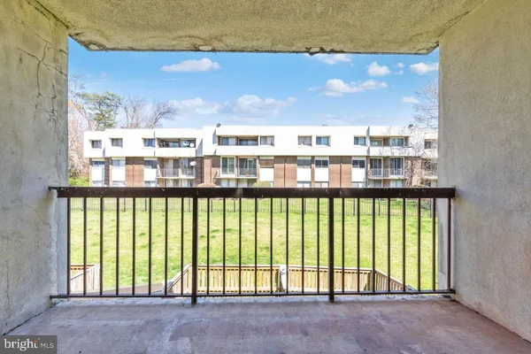 a view of a balcony with city view