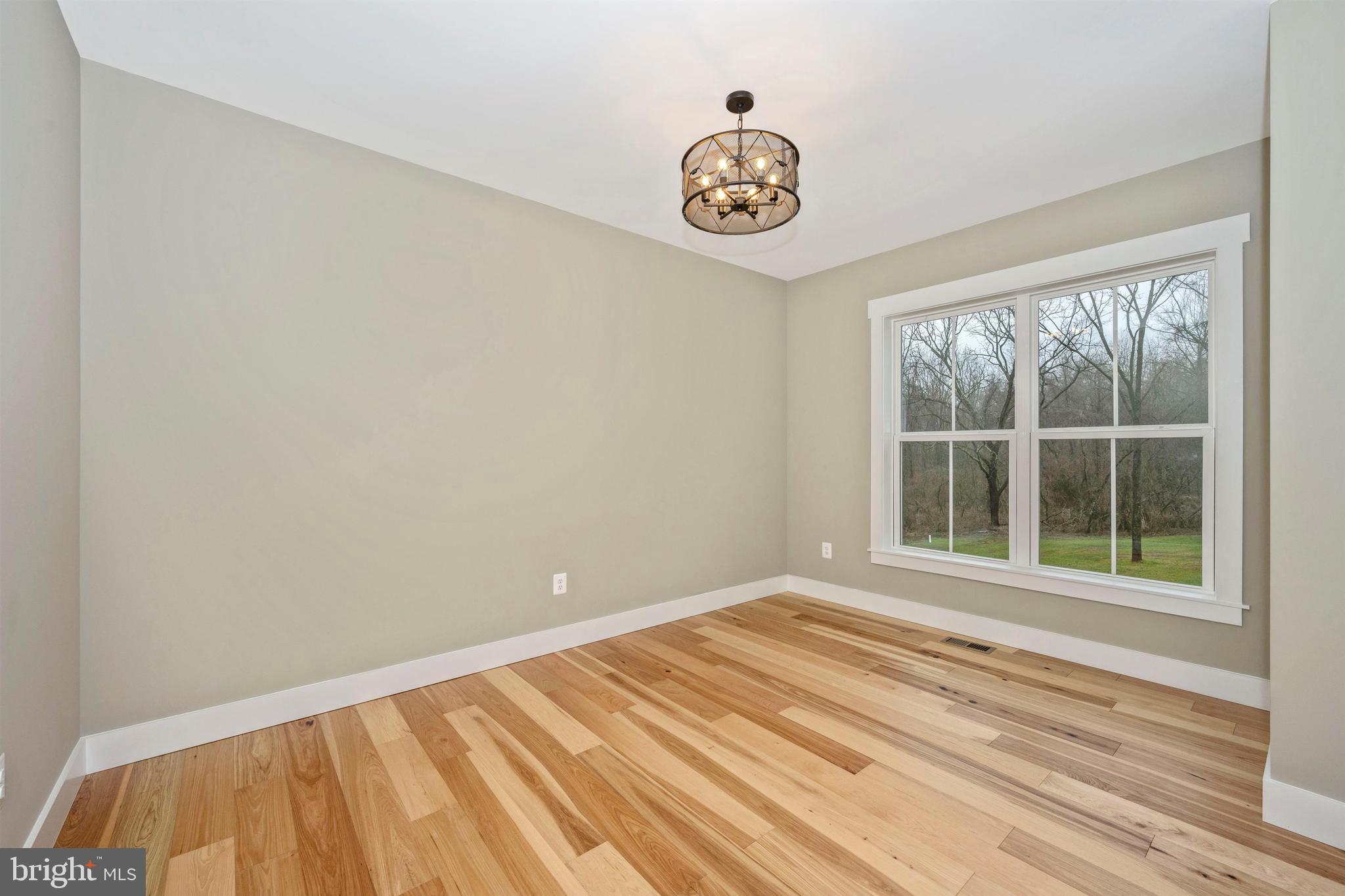 New London Road New Market, MD 21774 - Photo 11 of 68 a view of an empty room with a window
