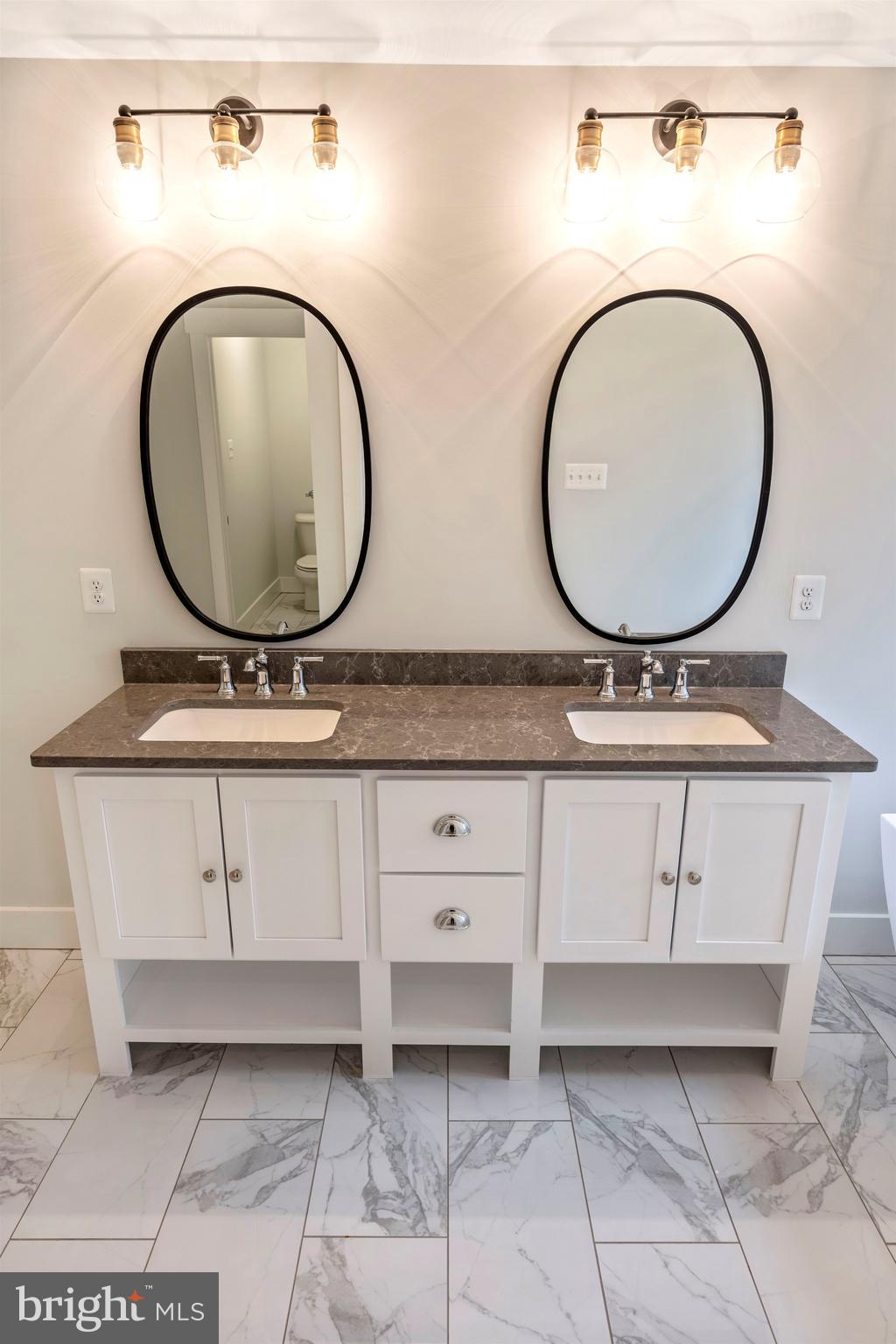 New London Road New Market, MD 21774 - Photo 32 of 68 a bathroom with a sink and a mirror