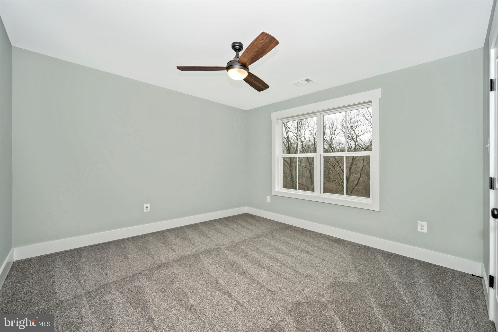 New London Road New Market, MD 21774 - Photo 40 of 68 an empty room with windows and white walls