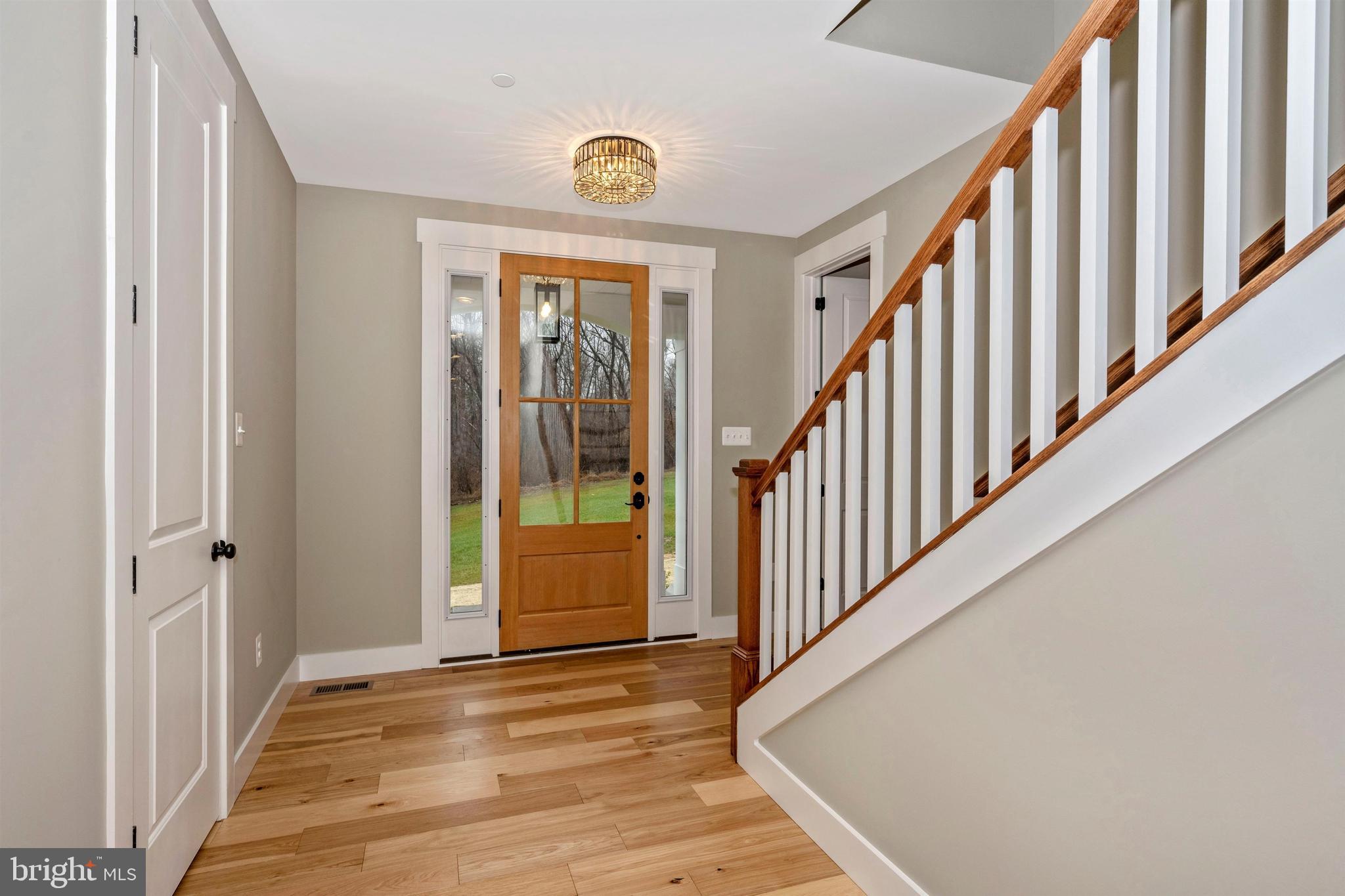 New London Road New Market, MD 21774 - Photo 5 of 68 a view of an entryway with wooden floor and door