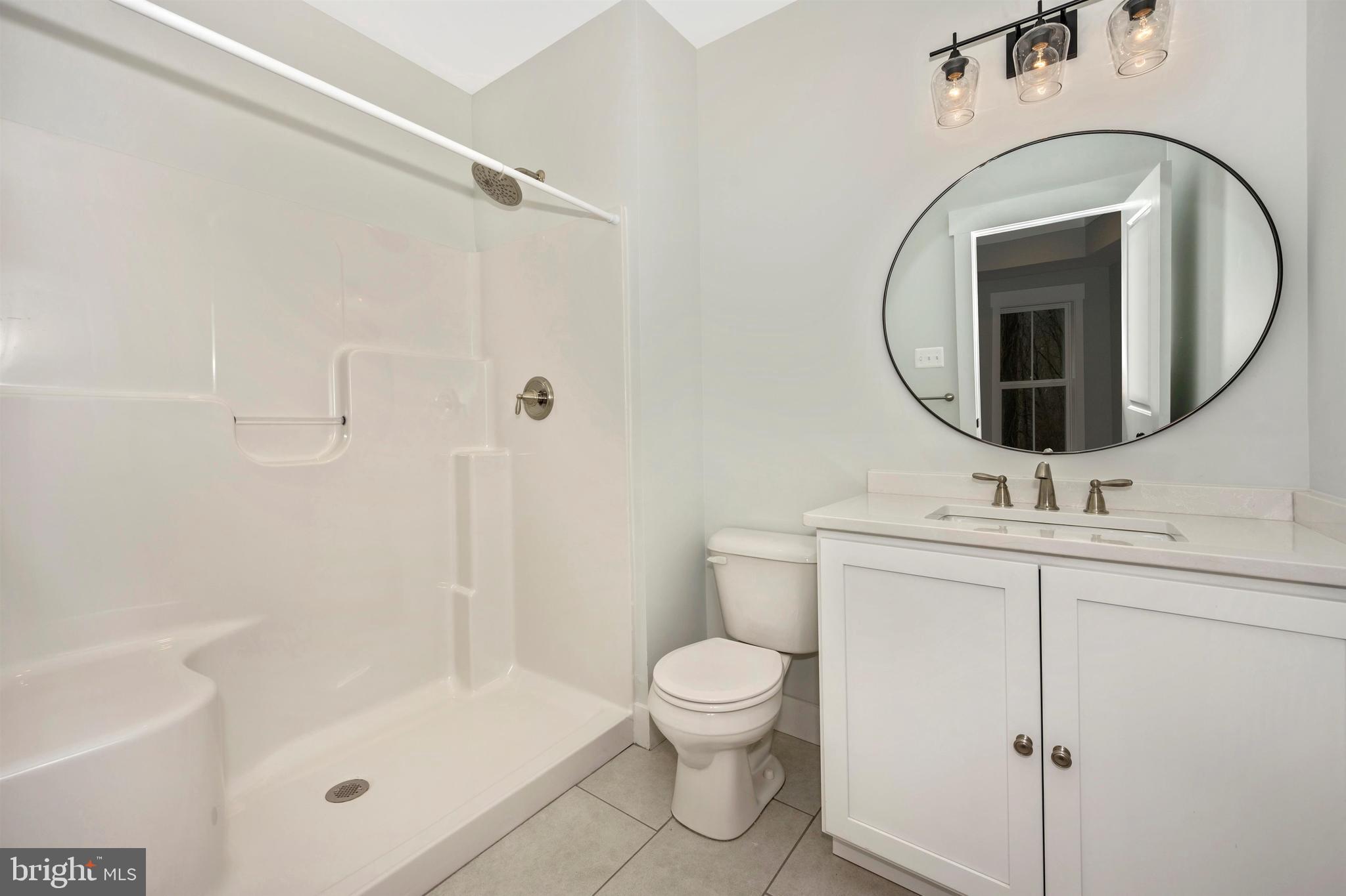 New London Road New Market, MD 21774 - Photo 49 of 68 a bathroom with a toilet sink and a mirror