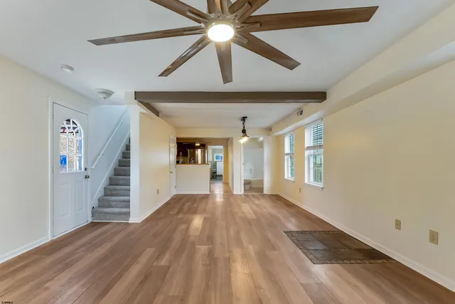 a kitchen with stainless steel appliances granite countertop a stove and a sink