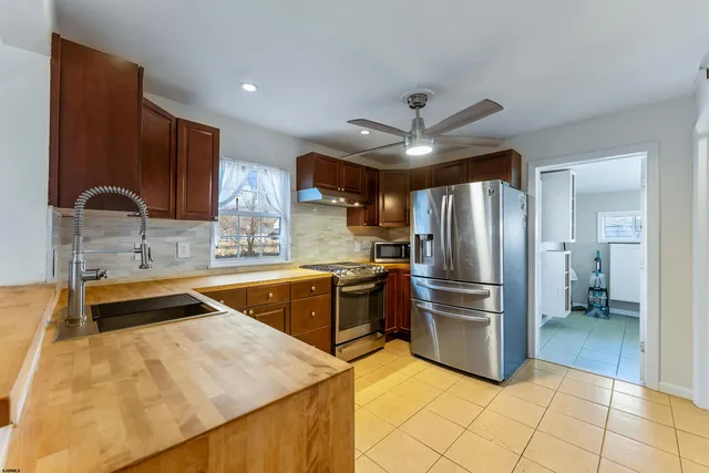 a front view of a house with a ocean view