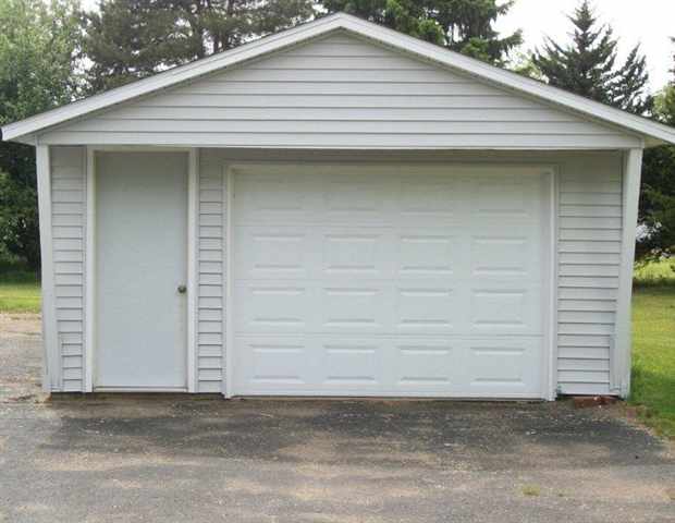 10429 2 Mile Road Thomson, IL 61285 - Photo 2 of 12 a view of a house with a garage