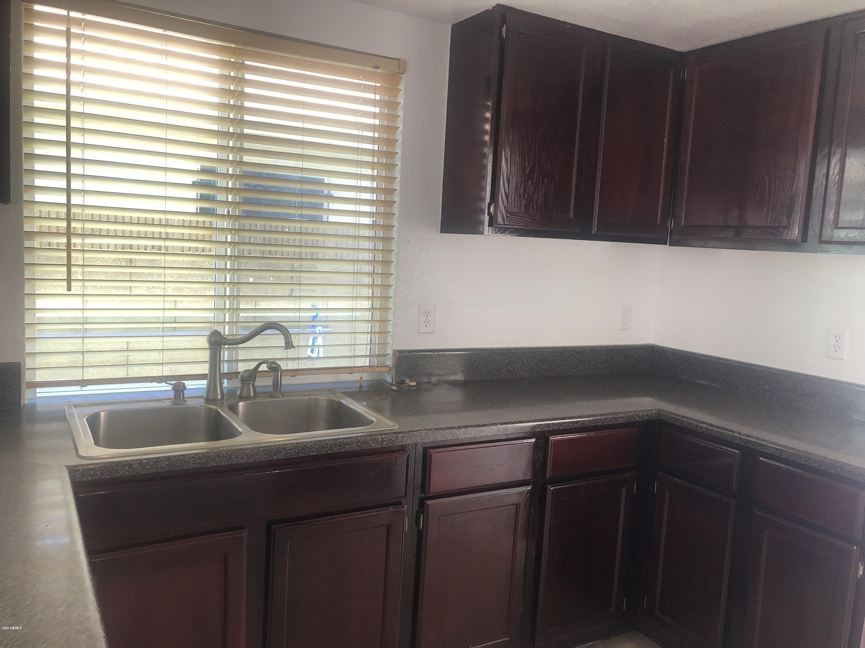 1748 East Vineyard Road Phoenix, AZ 85042 - Photo 5 of 25 IMG_3872