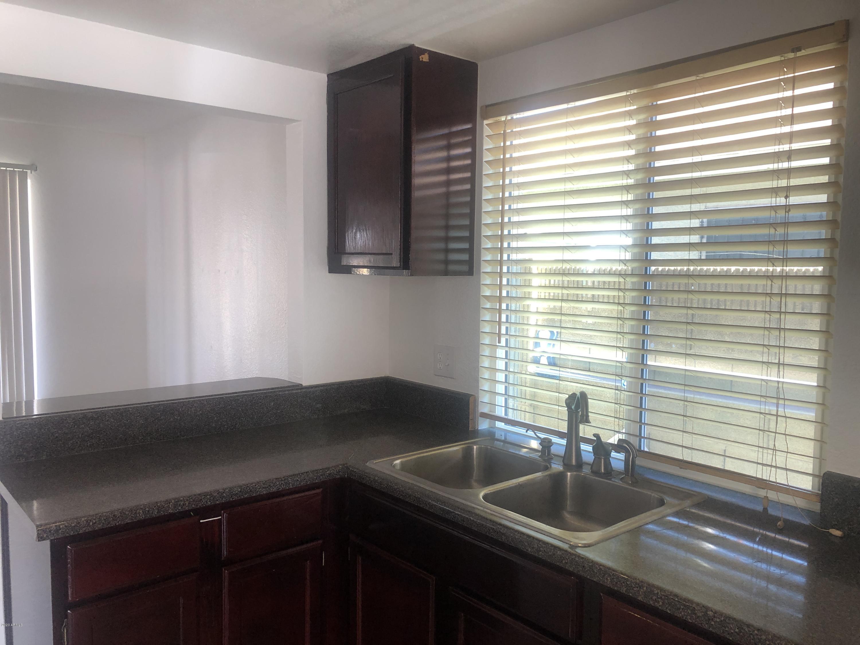1748 East Vineyard Road Phoenix, AZ 85042 - Photo 6 of 25 IMG_3874