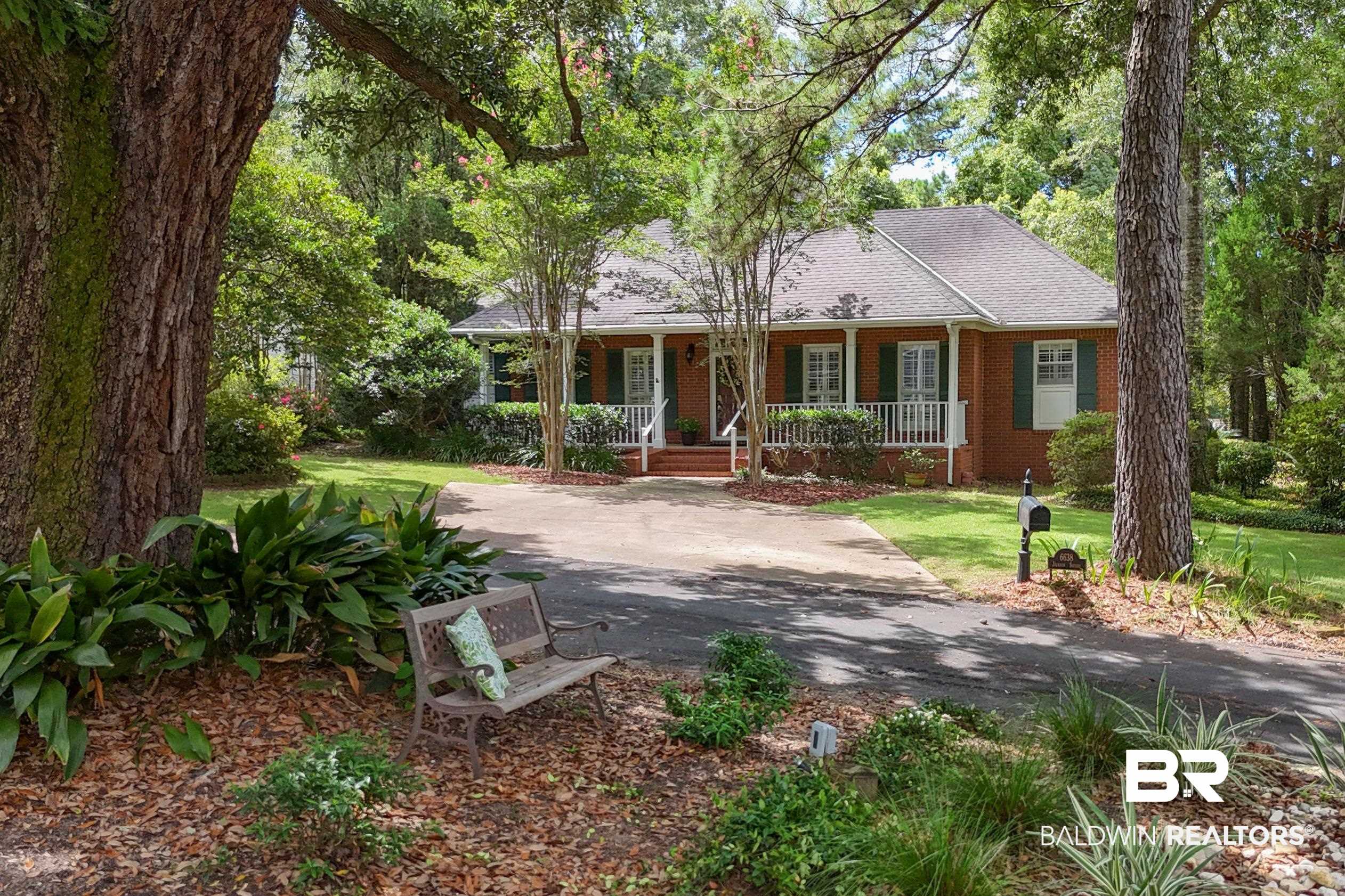 6638 Jackson Square Daphne, AL 36526 - Photo 58 of 62 Ranch-style house featuring a porch and a front lawn